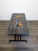 TABLE BASSE EN CERAMIQUE ET METAL. SIGNEE ADRI 1970