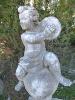  FOUR MUSICIANS PUTTI STATUE IN DRESSED STONE.
